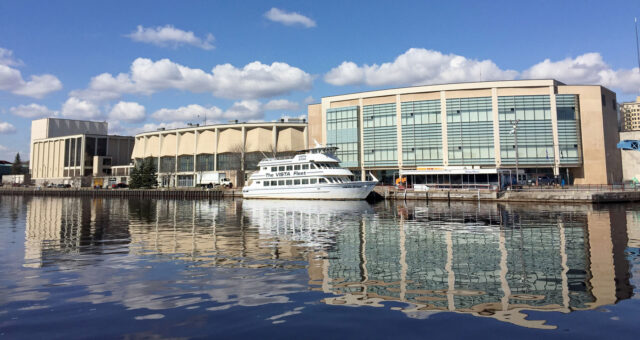 Vista fleet boat docked behind the DECC.
